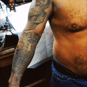 Custom armour tattoo