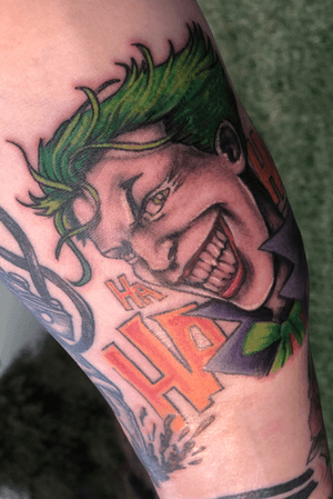 Comic Joker Ha Ha’s Forarm Tattoo
