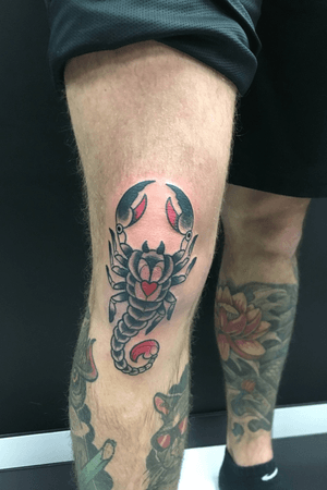 Scorpio knee tattoo