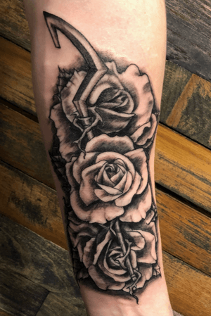 Roses + Sly Cooper’s cane. Both with signifcant meaning to myself and are symbols relating to family. #rose #flower #realism #game #gaming #slycooper #PlayStationTattoos 