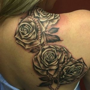 Tattoo done by Debbie (toxic30) in our levittown location 516-796-3151 #flowers #shading #rose #roses #pearls #skindeep #blackandgrey
