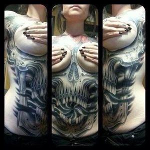 Underboob skull tattoo, Damn, girl. That's straight up radical. Done by Phil Colvin.