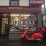 Black Hole Piercing and Tattoo