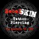 Rebel Skin Tattoo