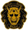 Golden Needle Tattoo