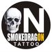 smoke dragon tattoo e piercing