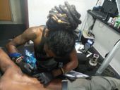 ශ්‍රී house Tattoos & Dreds