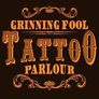 Pápa Grinning Fool Tattooing
