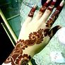 Henna tattoo and facial threading