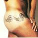 Male hip tattoo