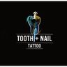 Tooth and nail tattoo