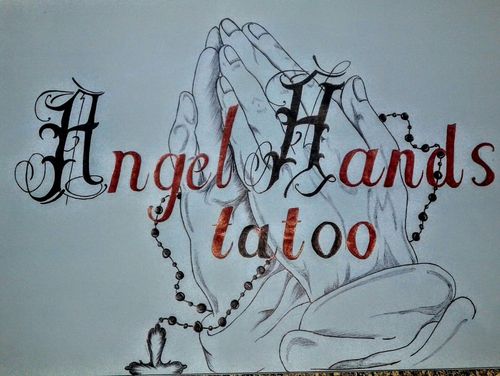 Angel hands tatoo