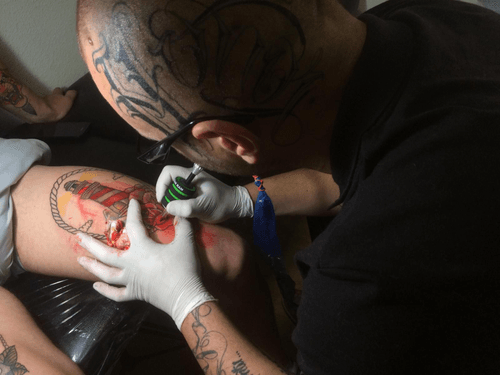 Juan kaos tattoo