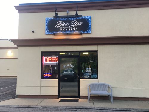 blue iris tattoo & body piercings