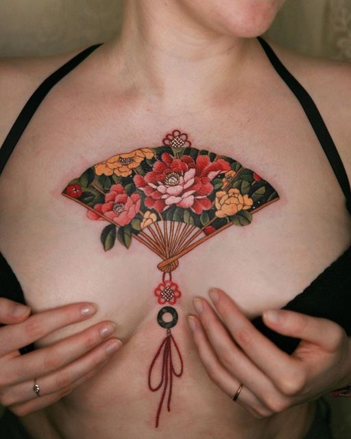 Chest tattoo by Sion #Sion #chesttattoo #sternumtattoo #chestpiecetattoo #japanese #korean #fan #peony #rose #norigae #flower #floral #color