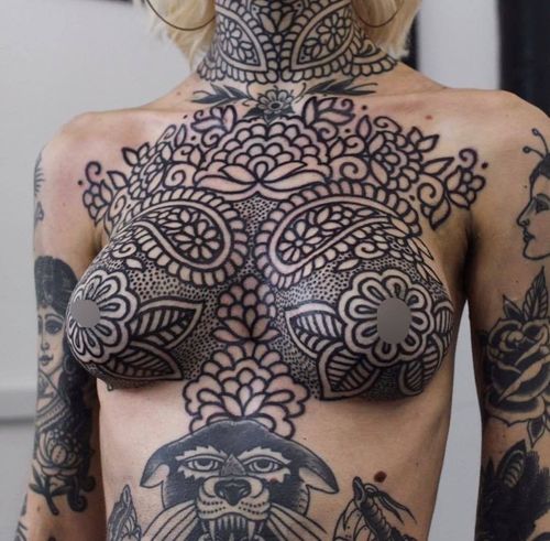 Chest tattoo by McKenzie Tattooer #McKenzieTattooer #chesttattoo #sternumtattoo #chestpiecetattoo #blackwork #floral #flower #pattern #Linework #dotwork