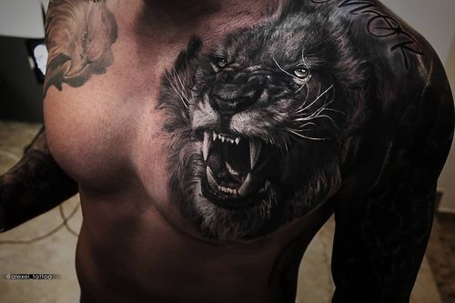 Chest tattoo by Alexei Mikhailov #AlexieMikhailov #chesttattoo #sternumtattoo #chestpiecetattoo #lion #blackandgrey #realism #realistic #animal