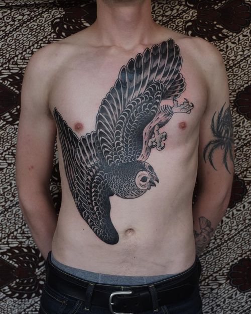 Chest tattoo by Victor J Webster #VictorJWebster #chesttattoo #sternumtattoo #chestpiecetattoo #blackandgrey #owl #illustrative #feathers #wings