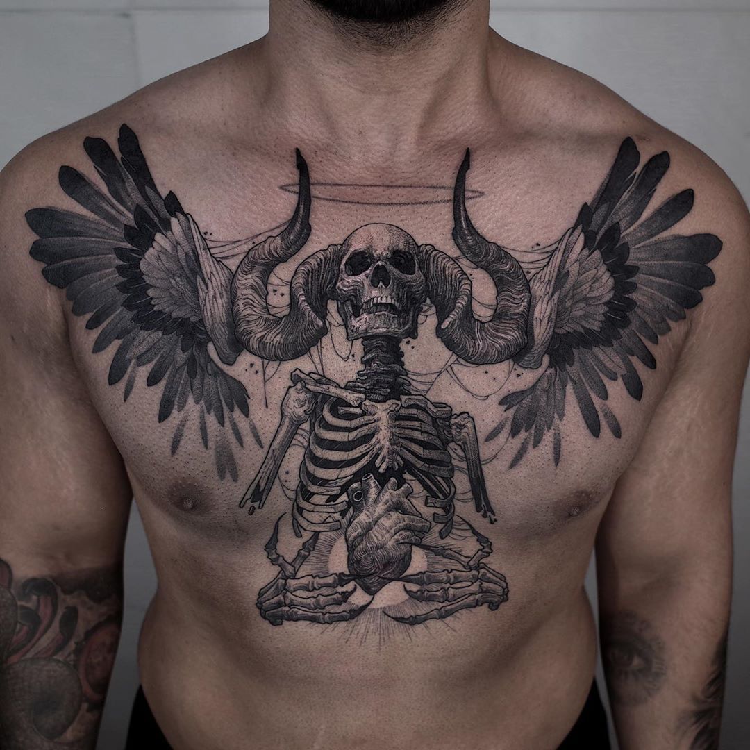 Tattoo of Skeleton look to be inside the the chest  rtattoo