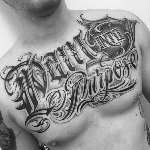 Chest tattoo by Kingsley Hayward #KingsleyHayward #chesttattoo #sternumtattoo #chestpiecetattoo #lettering #script #oldenglish #blackandgrey #dropshadow