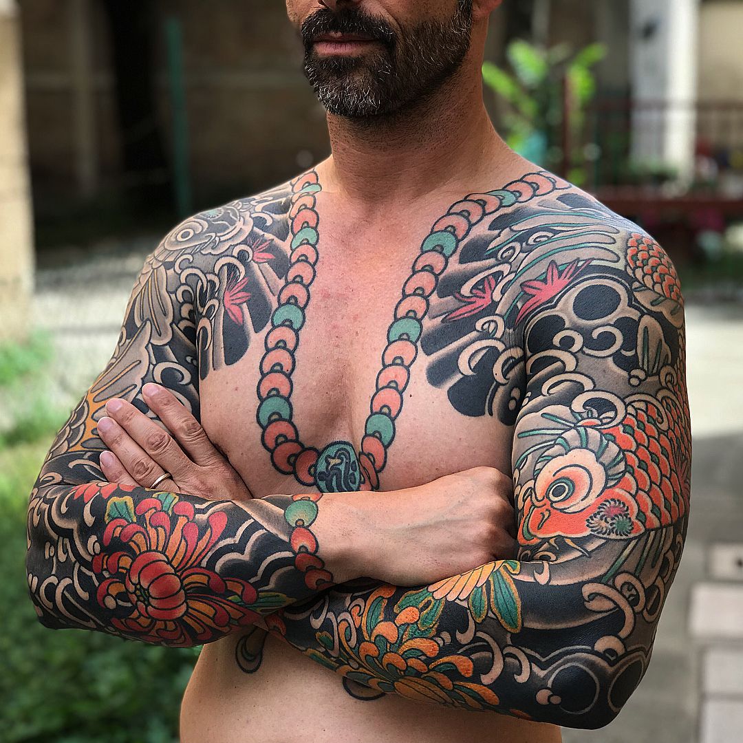 Abstract chest and sleeve tattoos by Supreme Drone in Los Angeles,  California! : r/tattoo