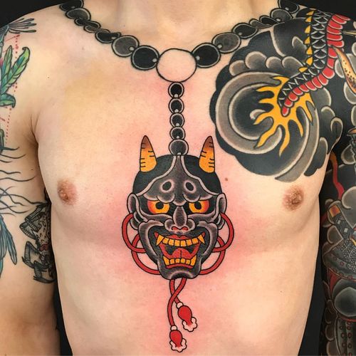 Chest tattoo by Kiku #Kiku #chesttattoo #sternumtattoo #chestpiecetattoo #hanya #beads #necklace #buddhist #mask #Japanese
