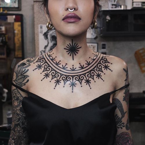 Chest tattoo by James Lau #JamesLau #chesttattoo #sternumtattoo #chestpiecetattoo #linework #dotwork #blackwork #tribal #pattern #stars #necktattoo