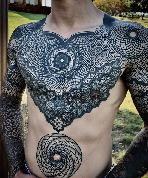 Chest tattoo by Nissaco #Nissaco #chesttattoo #sternumtattoo #chestpiecetattoo #geometric #sacredgeometry #mandala #linework #opticalillusion #pattern