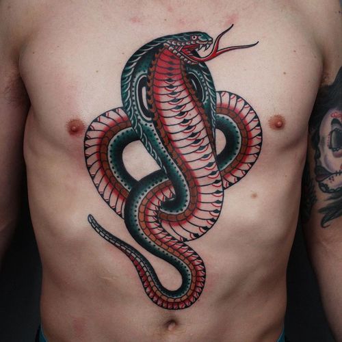 Chest tattoo by Tony Bluearms #TonyBluearms #chesttattoo #sternumtattoo #chestpiecetattoo #serpent #snake #cobra #color #traditional